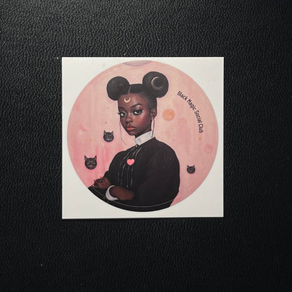 Sticker of a stylized illustration of a woman with black hair bun, surrounded by cats and a pink moon on a black background.